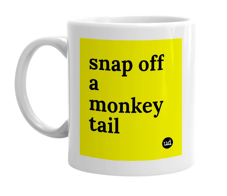 White mug with 'snap off a monkey tail' in bold black letters