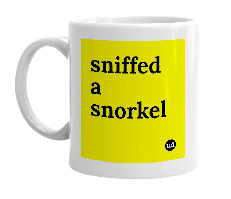 White mug with 'sniffed a snorkel' in bold black letters