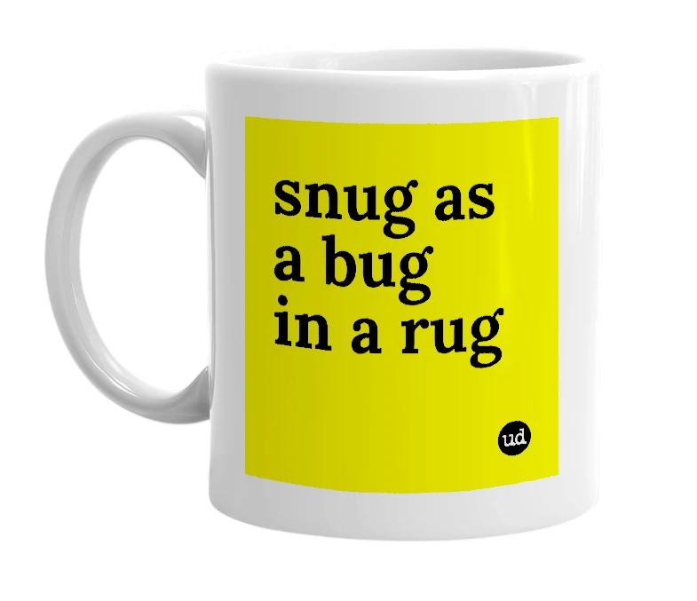 White mug with 'snug as a bug in a rug' in bold black letters