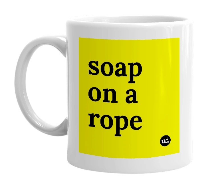 White mug with 'soap on a rope' in bold black letters