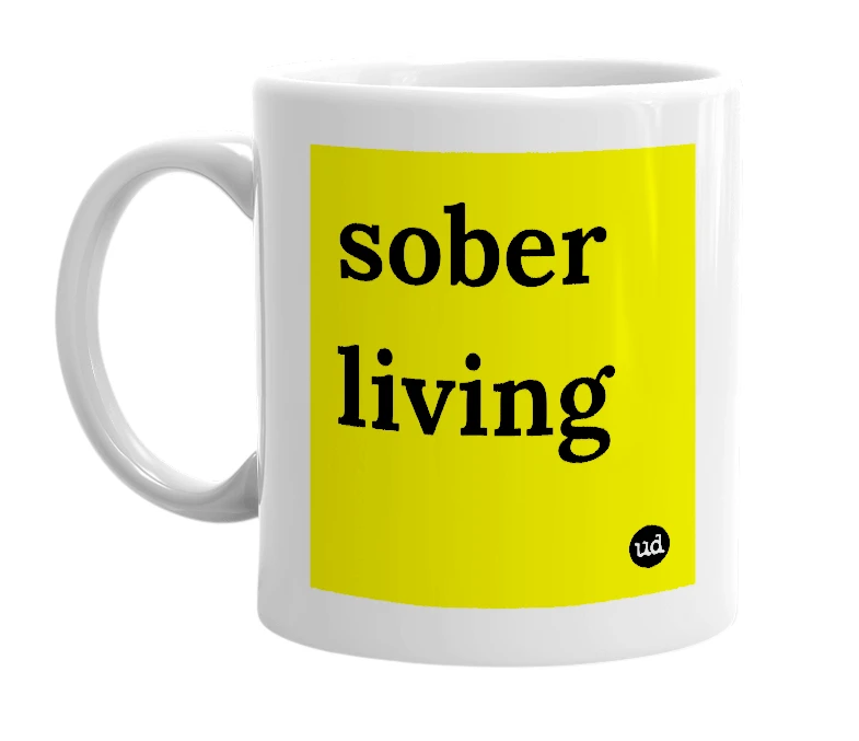 White mug with 'sober living' in bold black letters