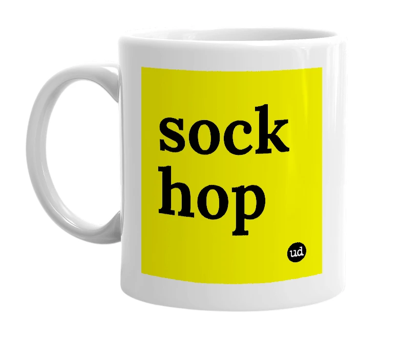 White mug with 'sock hop' in bold black letters