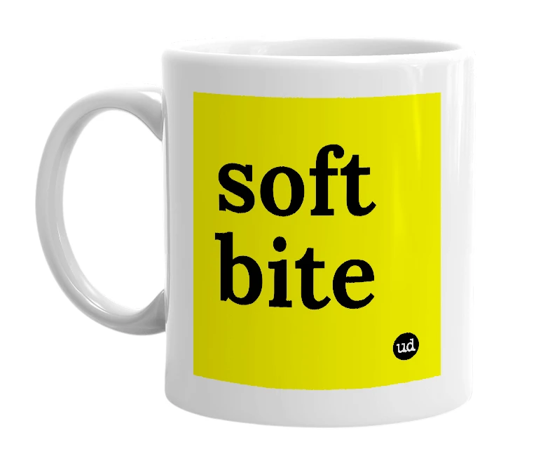 White mug with 'soft bite' in bold black letters