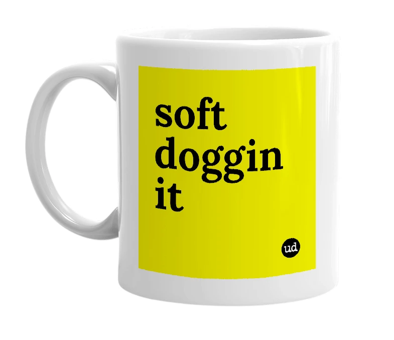 White mug with 'soft doggin it' in bold black letters