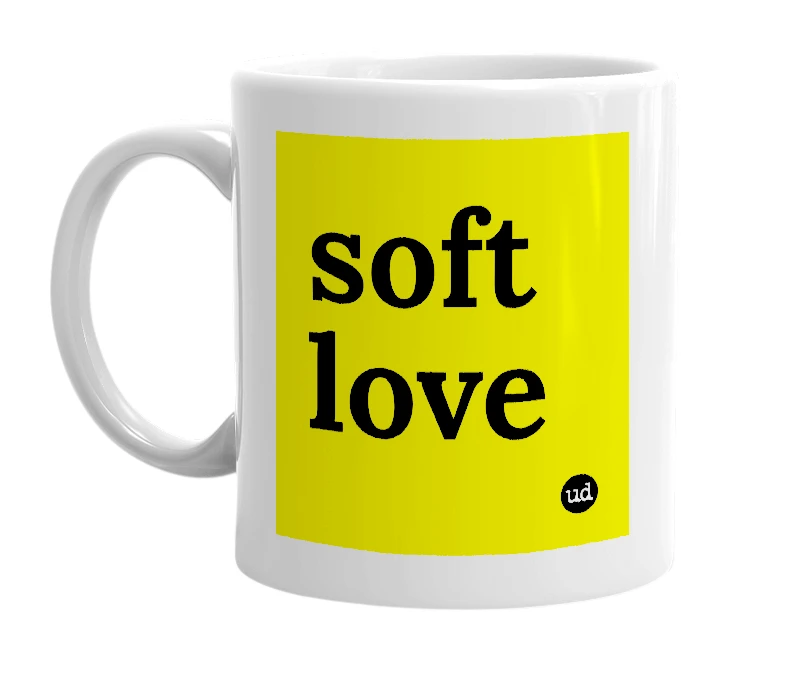 White mug with 'soft love' in bold black letters