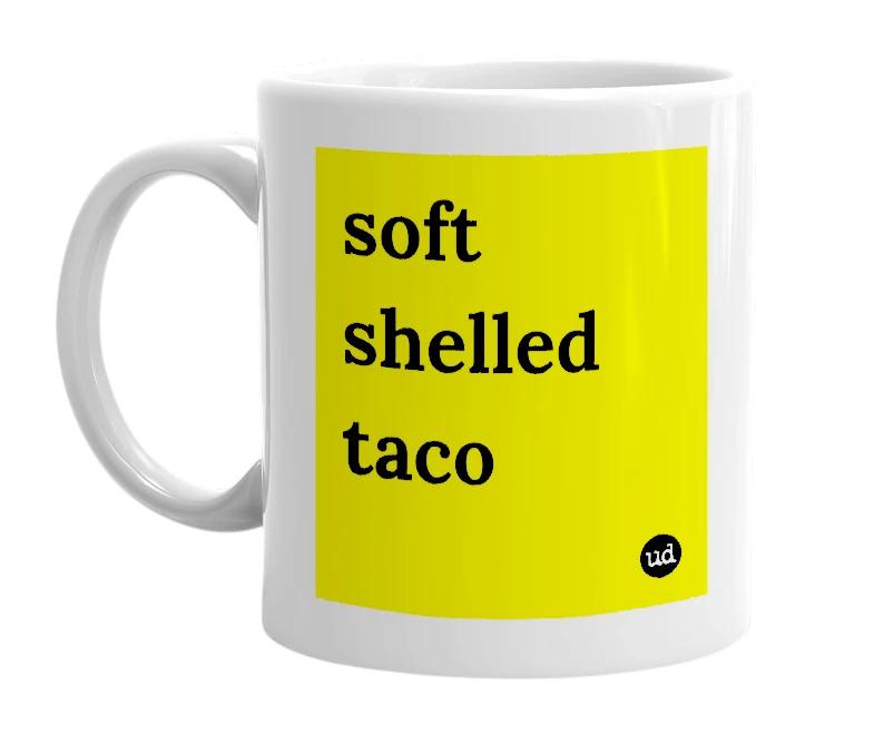 White mug with 'soft shelled taco' in bold black letters