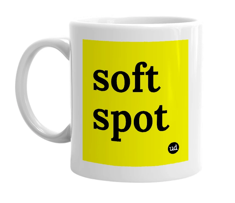 White mug with 'soft spot' in bold black letters