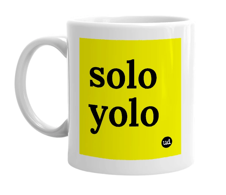 White mug with 'solo yolo' in bold black letters