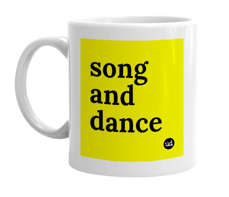 White mug with 'song and dance' in bold black letters