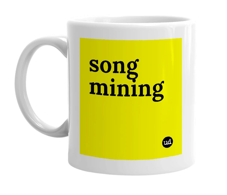 White mug with 'song mining' in bold black letters