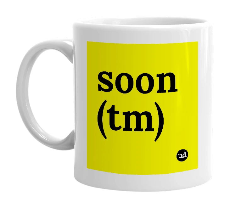 White mug with 'soon (tm)' in bold black letters