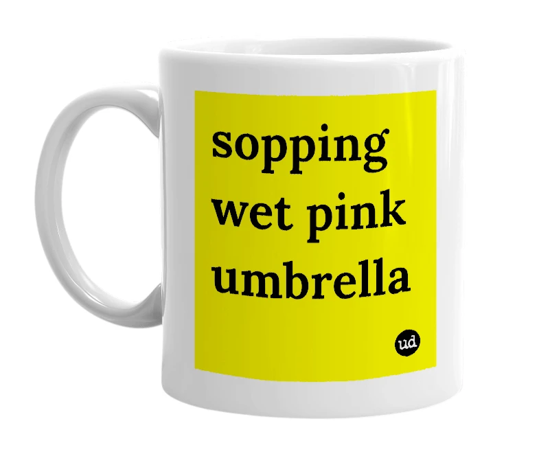 White mug with 'sopping wet pink umbrella' in bold black letters