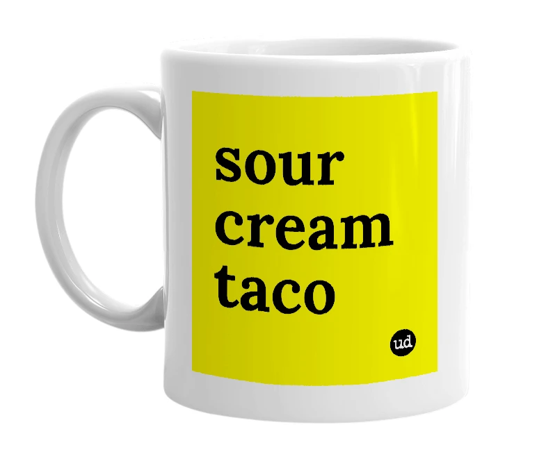 White mug with 'sour cream taco' in bold black letters