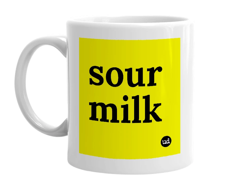 White mug with 'sour milk' in bold black letters