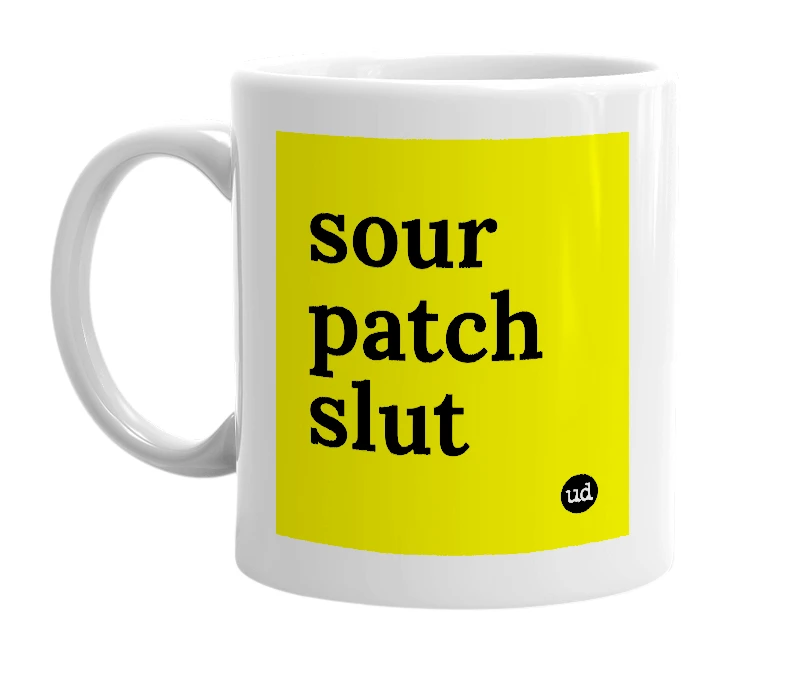 White mug with 'sour patch slut' in bold black letters