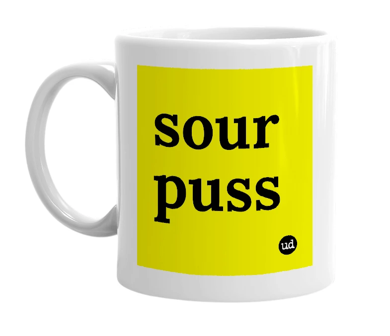 White mug with 'sour puss' in bold black letters