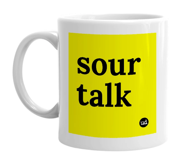 White mug with 'sour talk' in bold black letters
