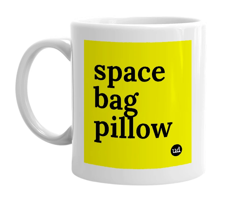 White mug with 'space bag pillow' in bold black letters