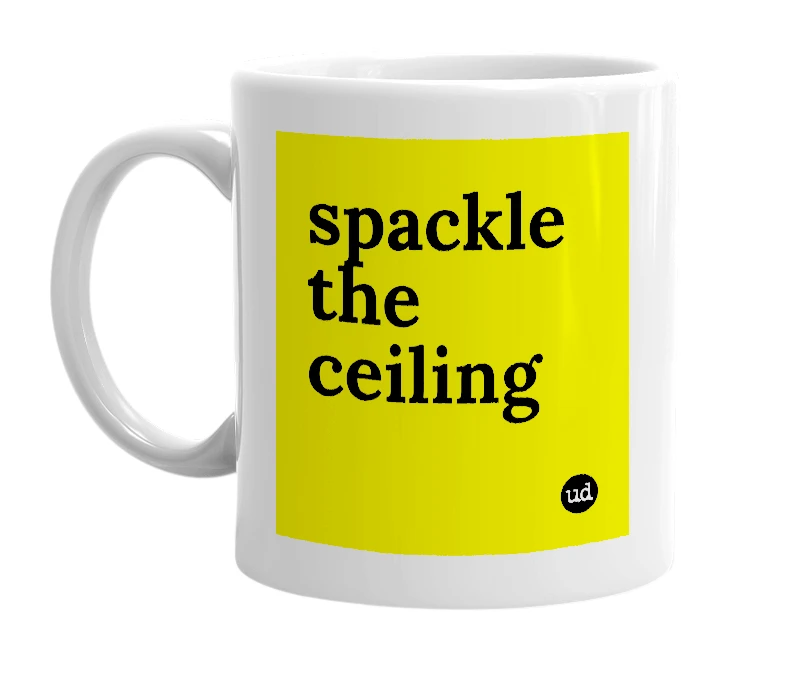 White mug with 'spackle the ceiling' in bold black letters