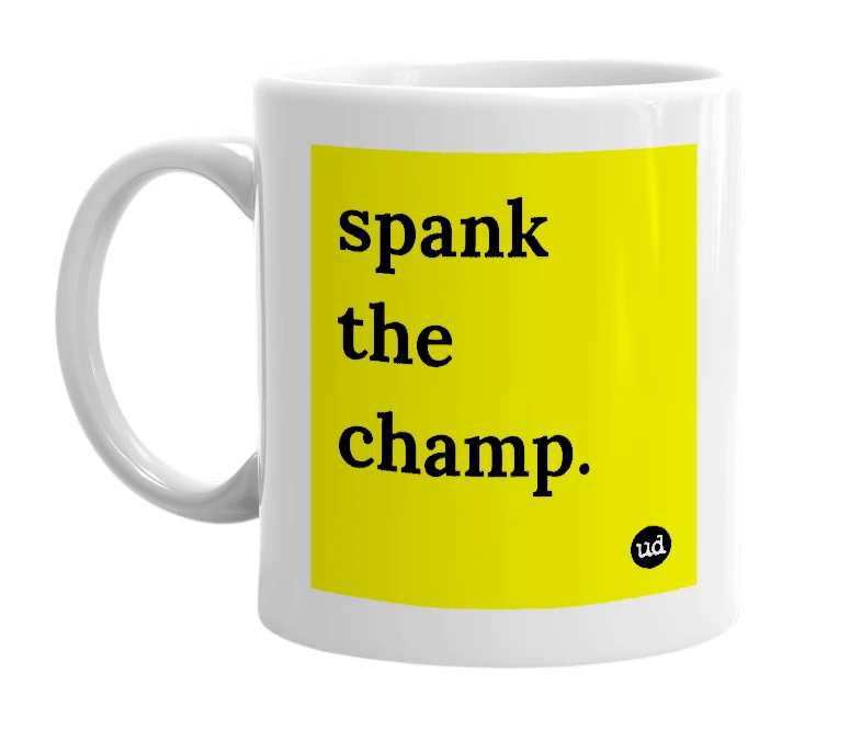 White mug with 'spank the champ.' in bold black letters
