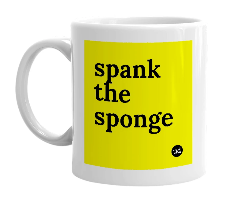 White mug with 'spank the sponge' in bold black letters