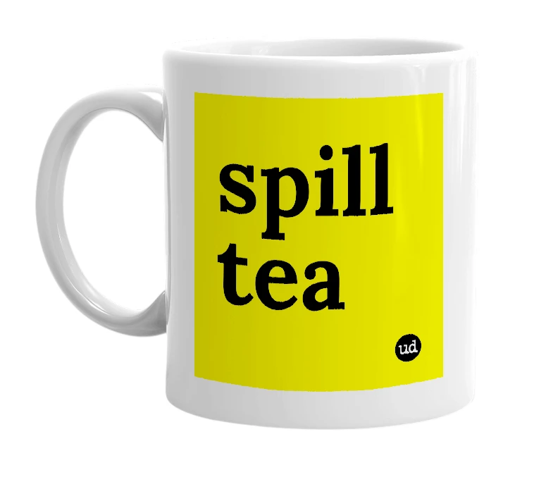 White mug with 'spill tea' in bold black letters