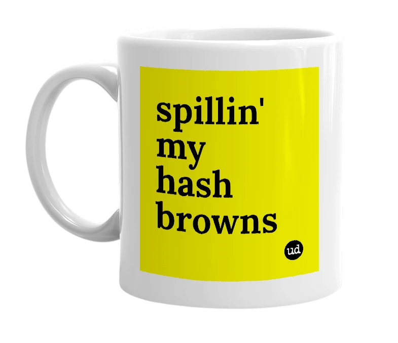 White mug with 'spillin' my hash browns' in bold black letters