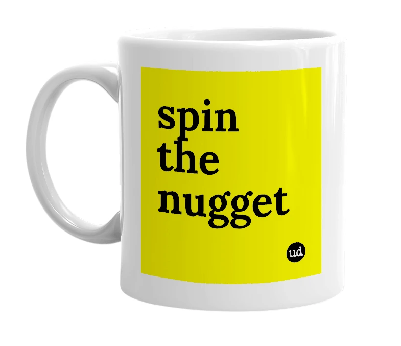 White mug with 'spin the nugget' in bold black letters