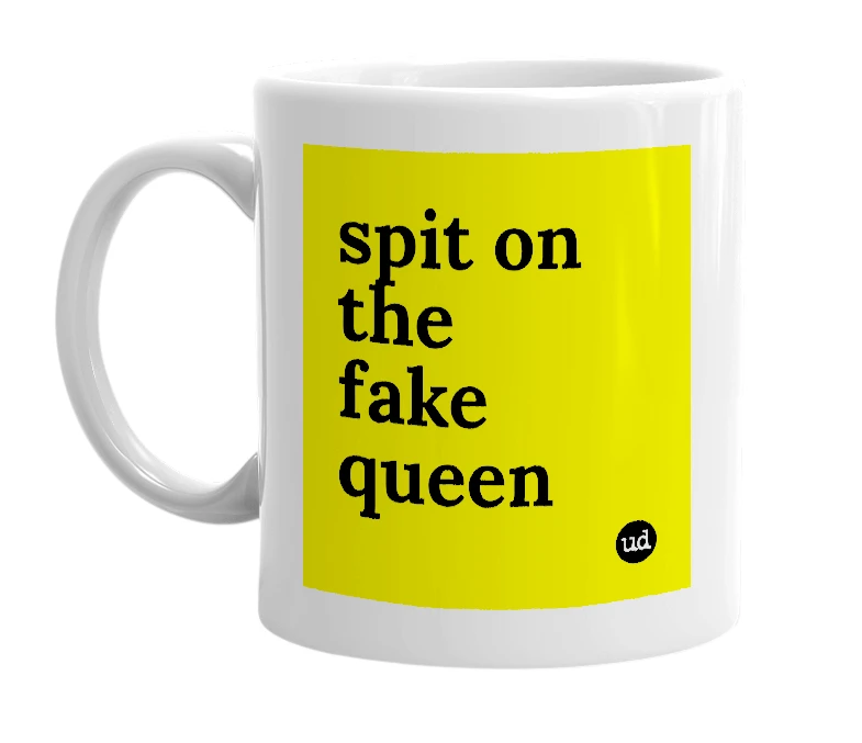 White mug with 'spit on the fake queen' in bold black letters