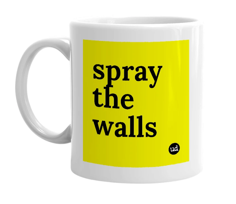White mug with 'spray the walls' in bold black letters