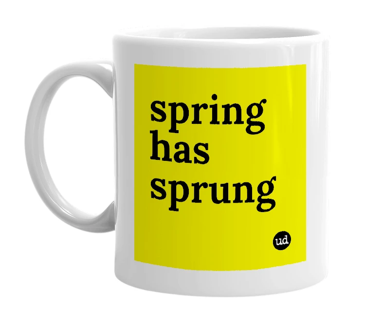 White mug with 'spring has sprung' in bold black letters