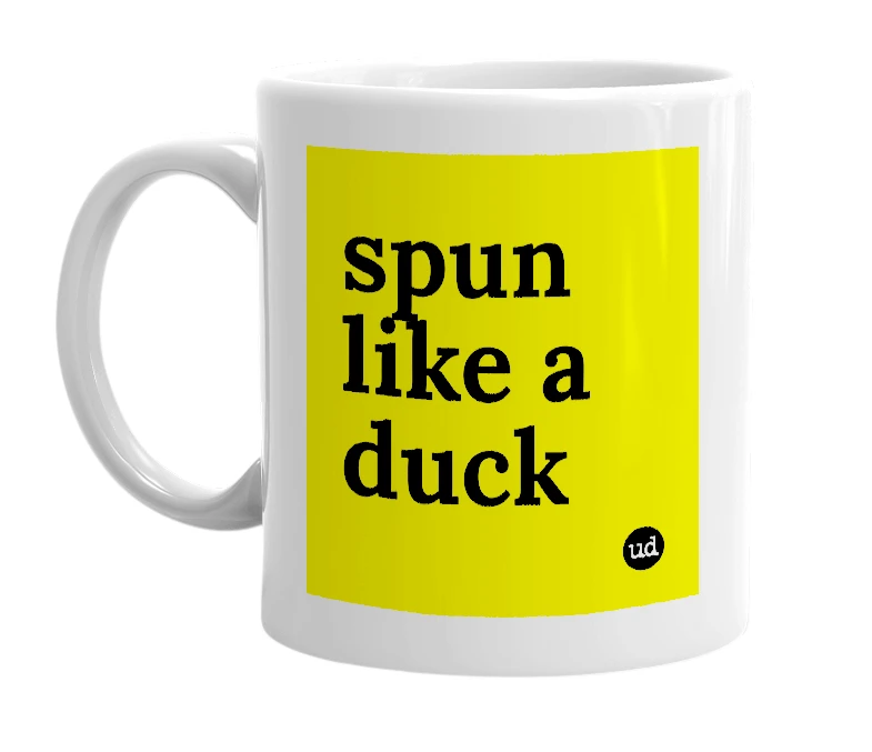 White mug with 'spun like a duck' in bold black letters