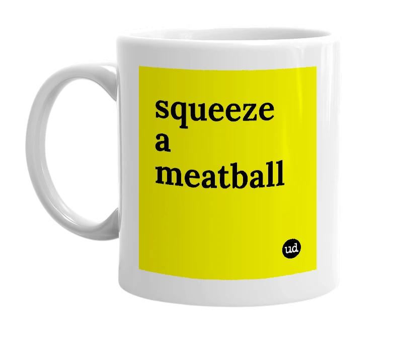 White mug with 'squeeze a meatball' in bold black letters