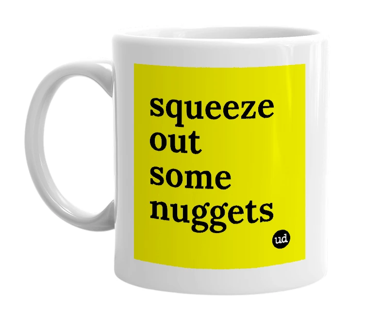 White mug with 'squeeze out some nuggets' in bold black letters