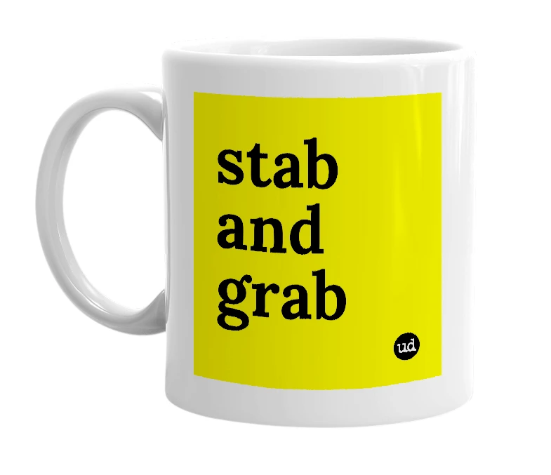 White mug with 'stab and grab' in bold black letters