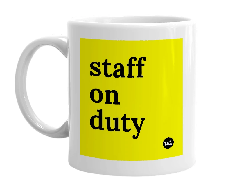 White mug with 'staff on duty' in bold black letters