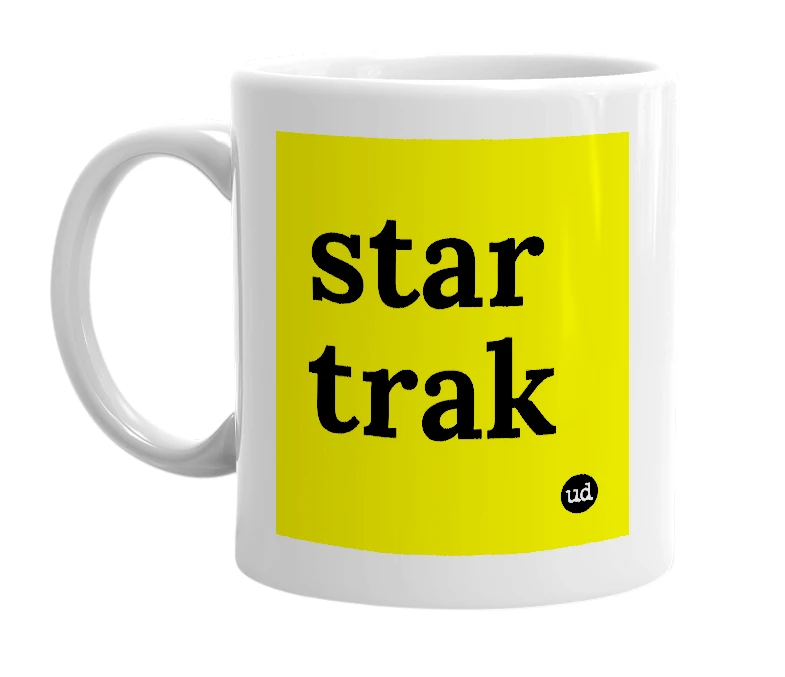 White mug with 'star trak' in bold black letters