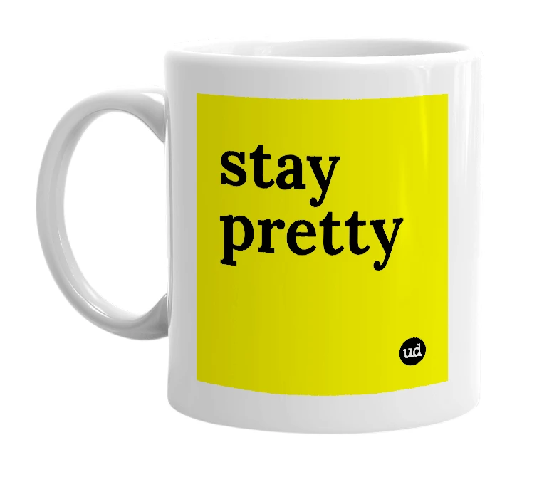 White mug with 'stay pretty' in bold black letters