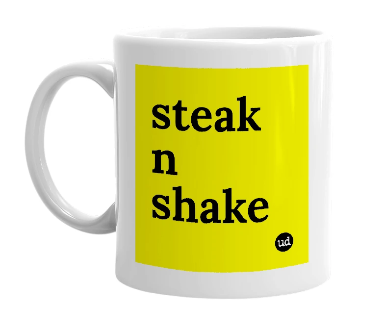 White mug with 'steak n shake' in bold black letters