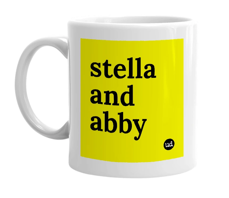 White mug with 'stella and abby' in bold black letters