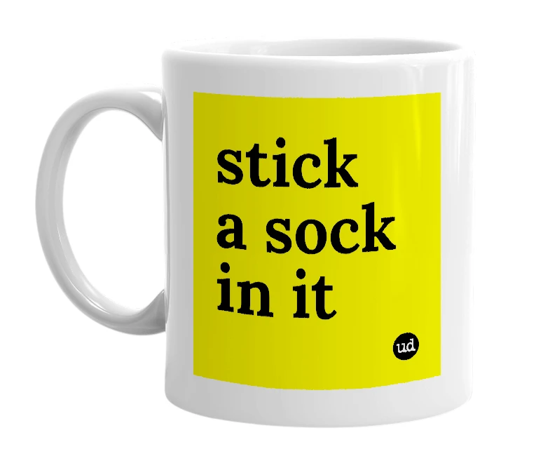 White mug with 'stick a sock in it' in bold black letters