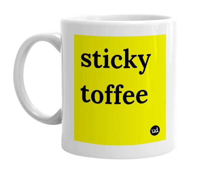 White mug with 'sticky toffee' in bold black letters