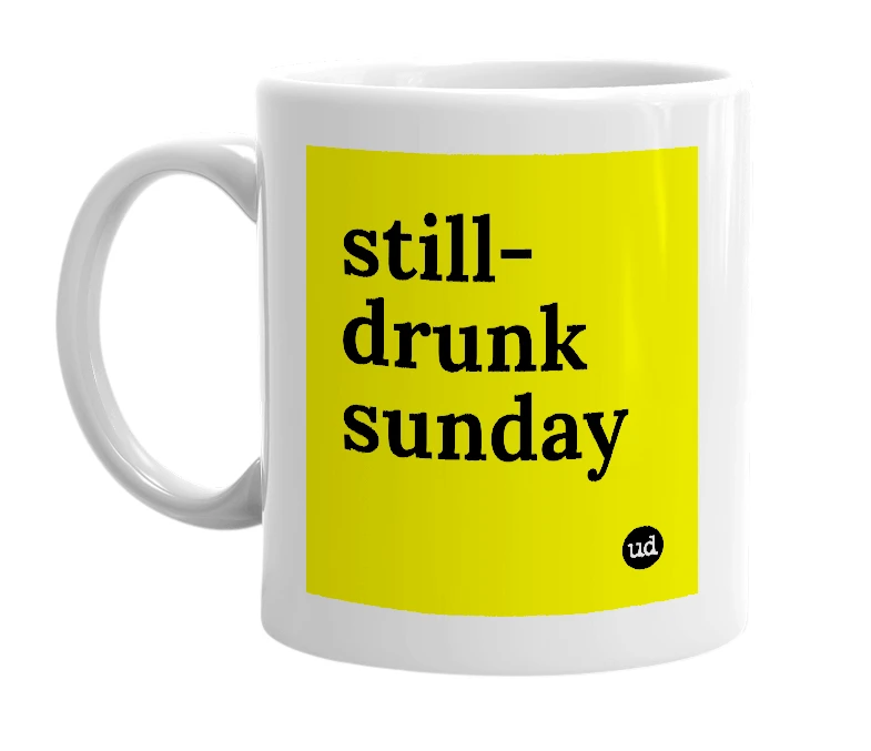 White mug with 'still-drunk sunday' in bold black letters
