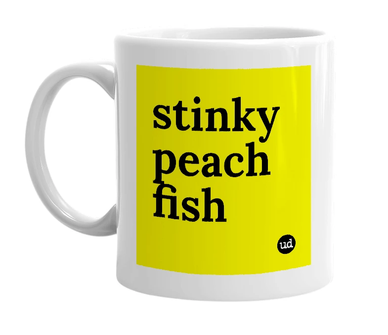 White mug with 'stinky peach fish' in bold black letters