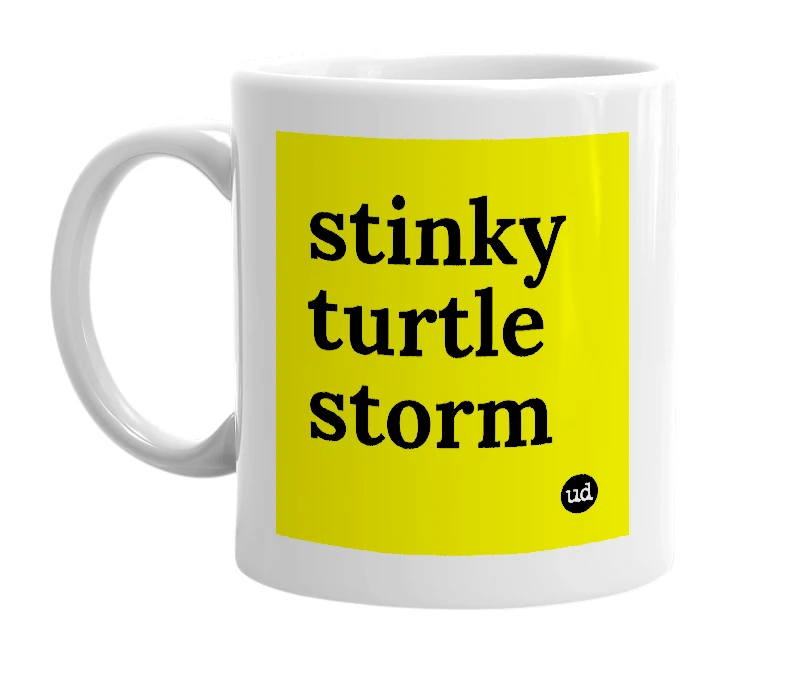 White mug with 'stinky turtle storm' in bold black letters