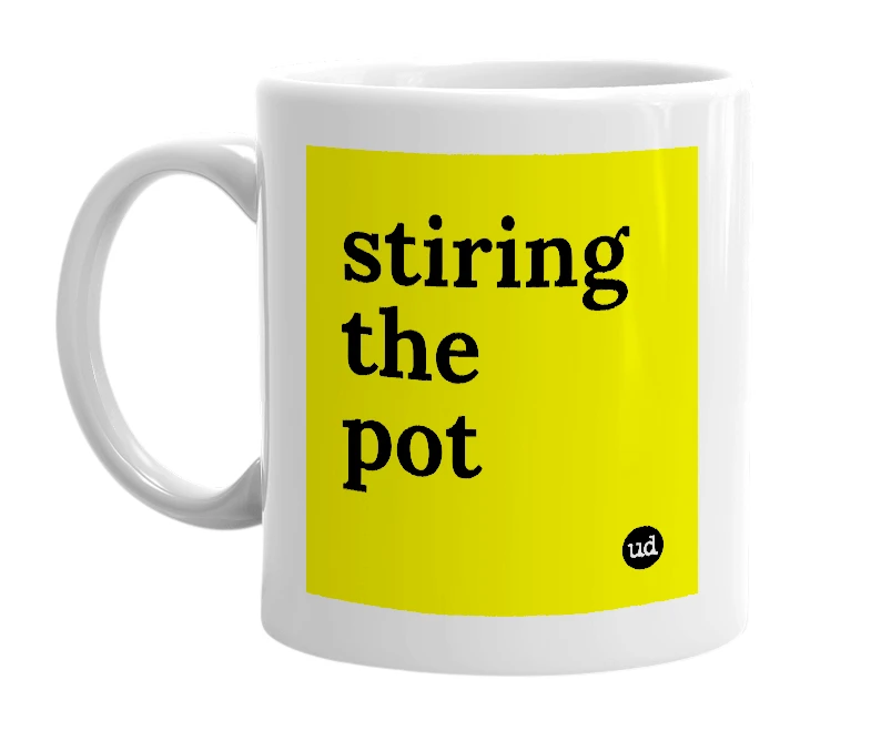 White mug with 'stiring the pot' in bold black letters