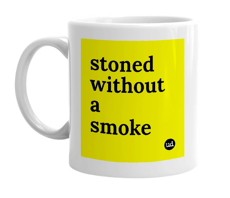 White mug with 'stoned without a smoke' in bold black letters