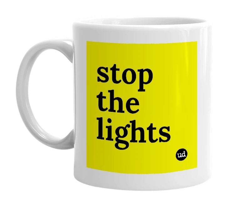 White mug with 'stop the lights' in bold black letters