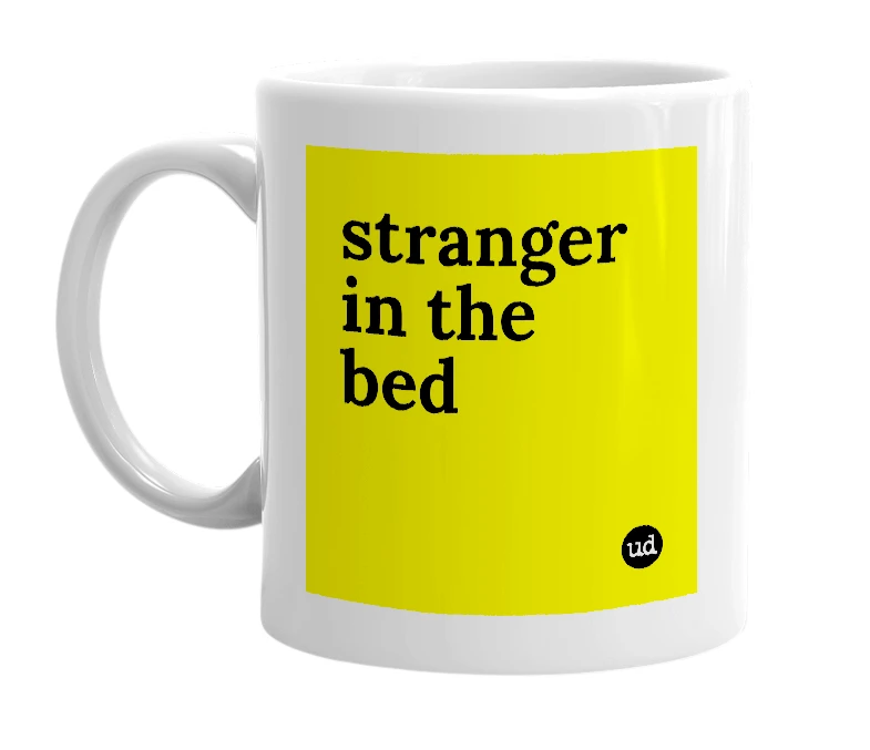 White mug with 'stranger in the bed' in bold black letters