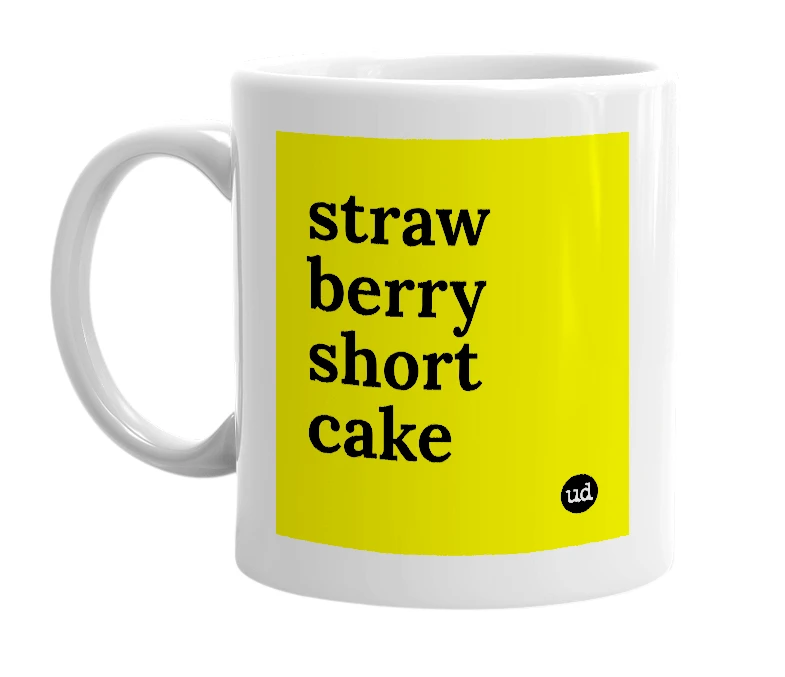 White mug with 'straw berry short cake' in bold black letters